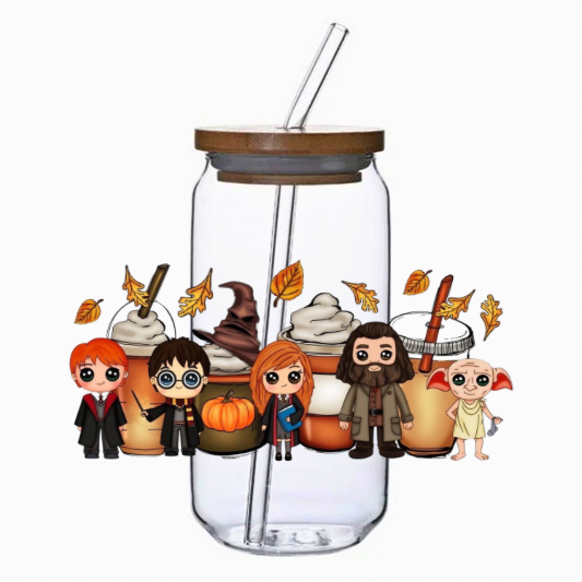 Glass tumbler with straw featuring cartoon characters and autumn-themed illustrations on a white background