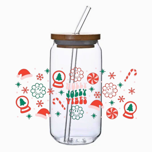 Clear glass tumbler with bamboo lid and straw, decorated with festive patterns on a white background