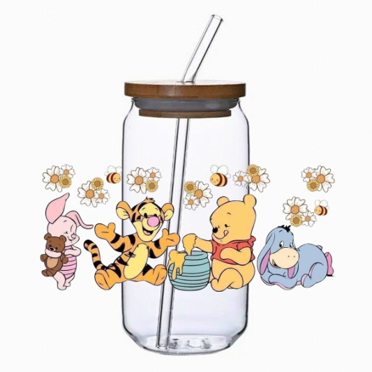 Clear tumbler with honey bear and friends design on a white background