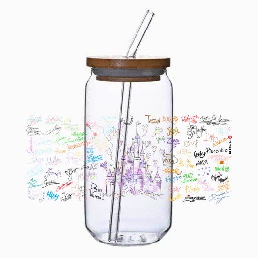 Clear glass tumbler with bamboo lid and straw, featuring colorful graphics and text on a white background