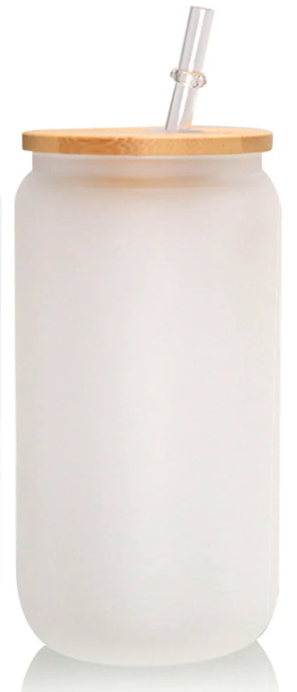 Frosted glass tumbler with bamboo lid and straw on a white background