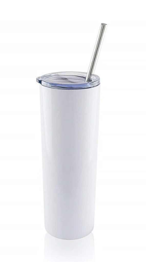 White tumbler with a metal straw on a white background