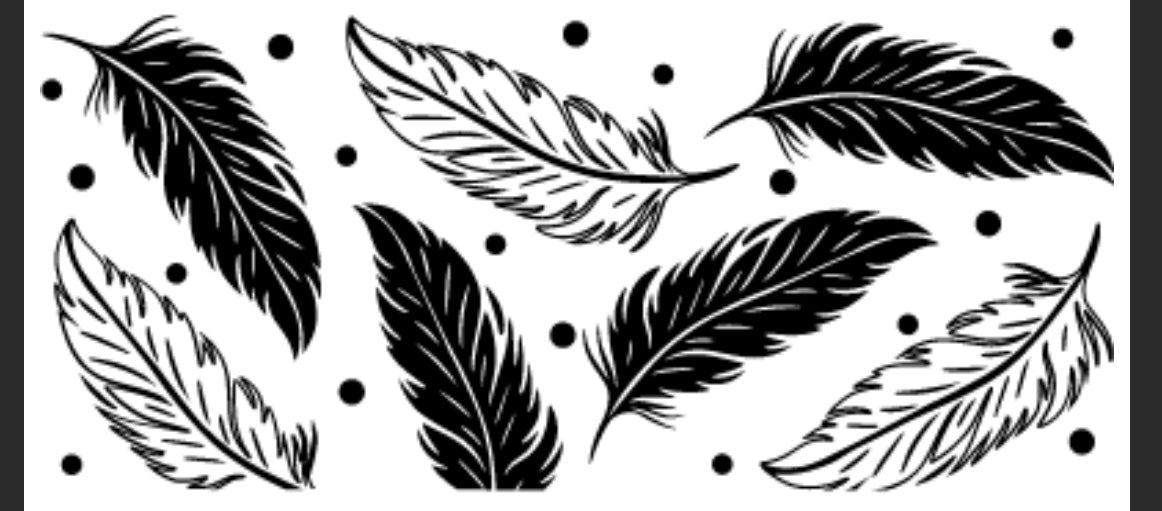 A sheet of black vinyl feather decals on a white background with polka dots.