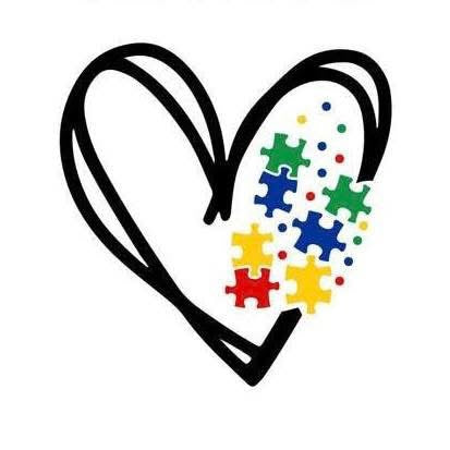 Black heart outline with colorful puzzle pieces inside on a white background