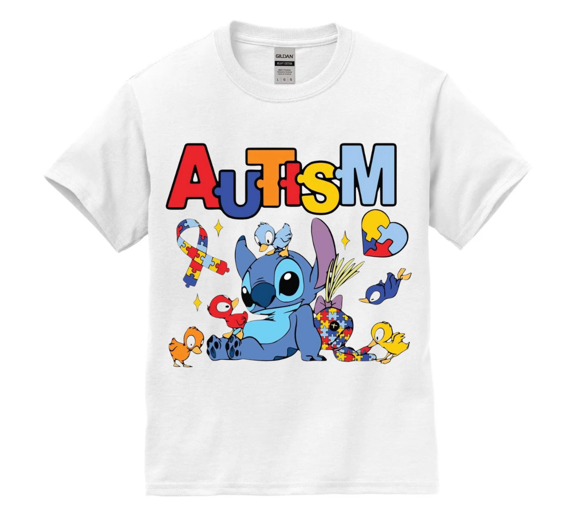 White t-shirt with cartoon character and autism awareness symbols on a white background