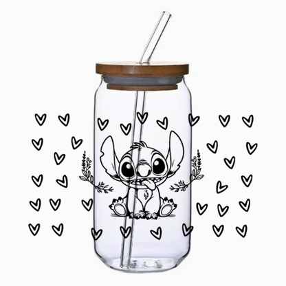 Glass tumbler with straw and lid featuring a cartoon character surrounded by hearts on a white background.