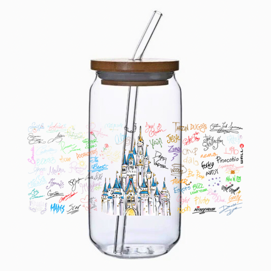 Clear glass tumbler with bamboo lid and straw featuring a castle design and colorful signatures on a white background.