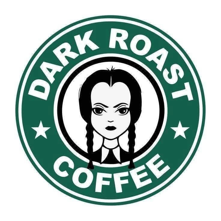 Dark Roast Coffee logo with a stylized face in the center