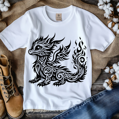 White t-shirt with black dragon design on a rustic background with boots and jeans.