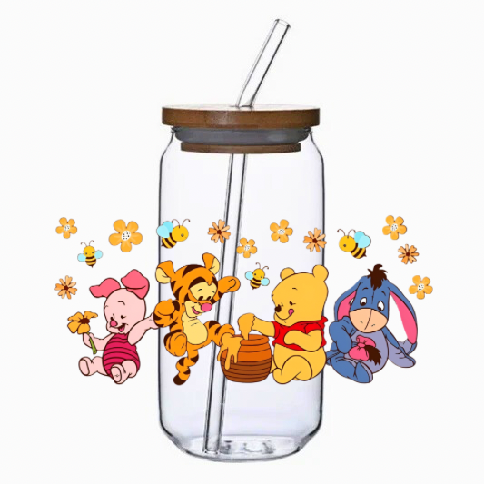 Glass tumbler with bamboo lid and straw featuring cartoon characters on a white background