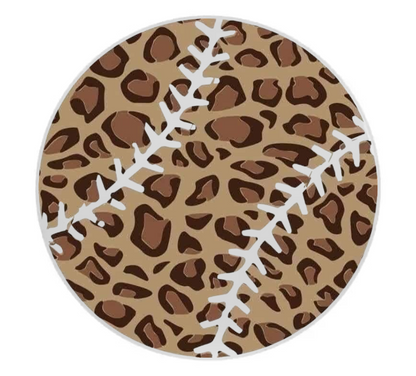 Round coaster with leopard print pattern and white stitching details on a beige background