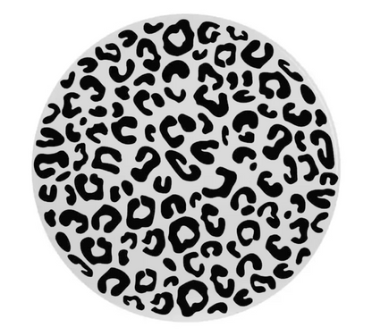 Round coaster with black leopard print pattern on a white background