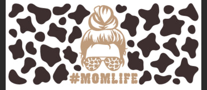 A graphic decal with a cow print background and the text '#MOMLIFE' at the top, featuring a stylized representation of a woman's headwear and glasses.