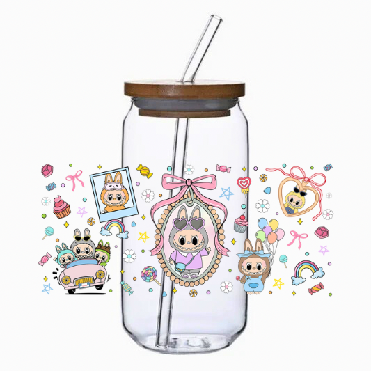 Clear tumbler with mystical cartoon characters and decorative elements on a white background