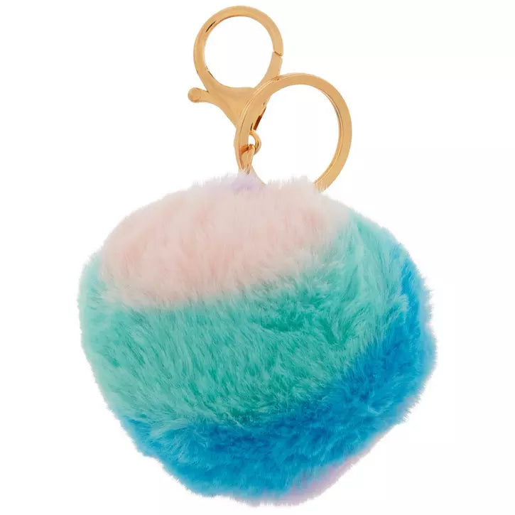 Two-tone blue and pink fluffy keychain on a white background