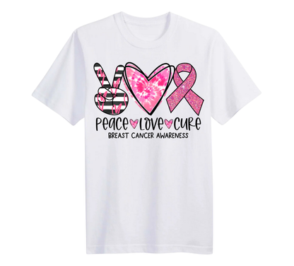 White t-shirt with pink ribbon, heart, and peace sign design for breast cancer awareness on a white background.