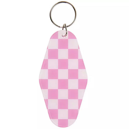 Pink and white checkered keychain on a white background