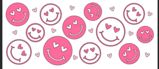 A collection of pink smiley face decals with hearts around them, designed for customization on various items like cups and clothing.