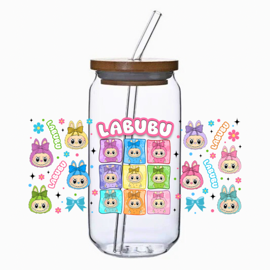 Clear tumbler with bamboo lid and straw featuring colorful monster characters design on a white background.