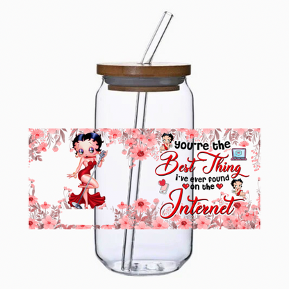 Glass tumbler with straw featuring a beautiful cartoon character and text on a white background