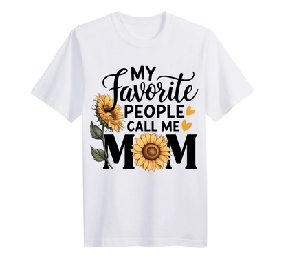 White t-shirt with sunflower design and text 'My favorite people call me Mom' on a white background