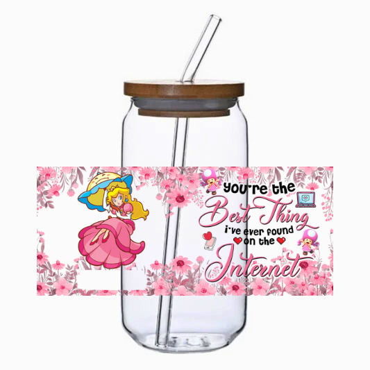 Glass tumbler with straw and bamboo lid, featuring a princess cartoon character and text on a white background