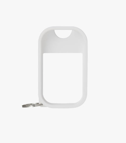 White hand sanitizer keychain case on a white background