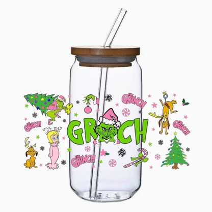 Clear tumbler with Christmas-themed designs and a bamboo lid on a white background